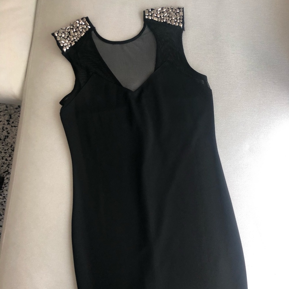 Black mini dress with studded shoulders